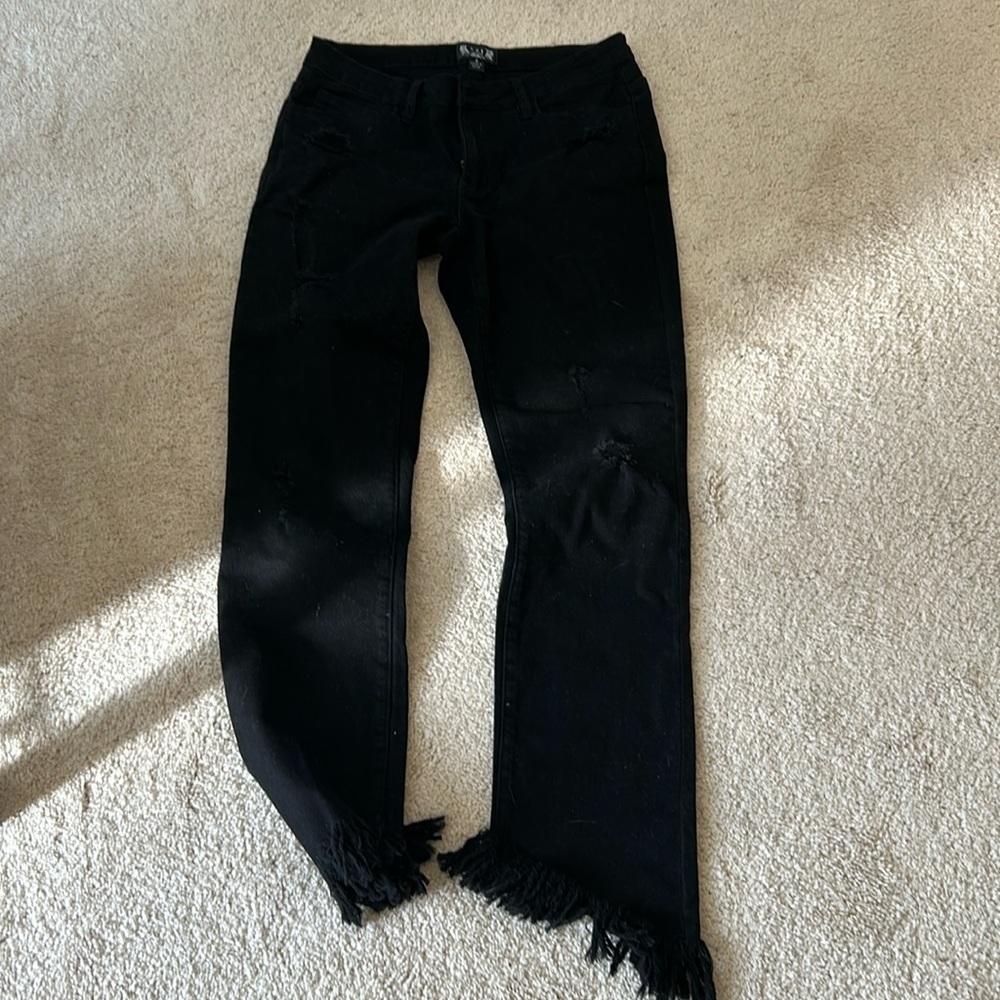 Black fringed jeans